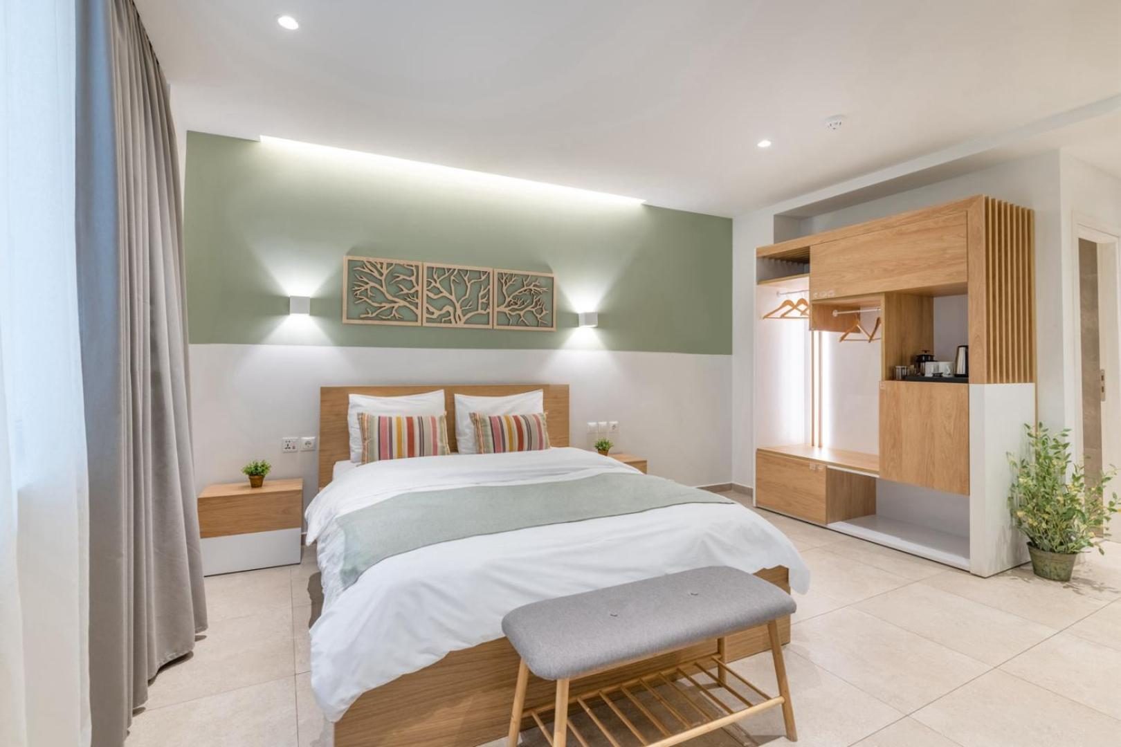 Studio Two, evening cove light over the bed
