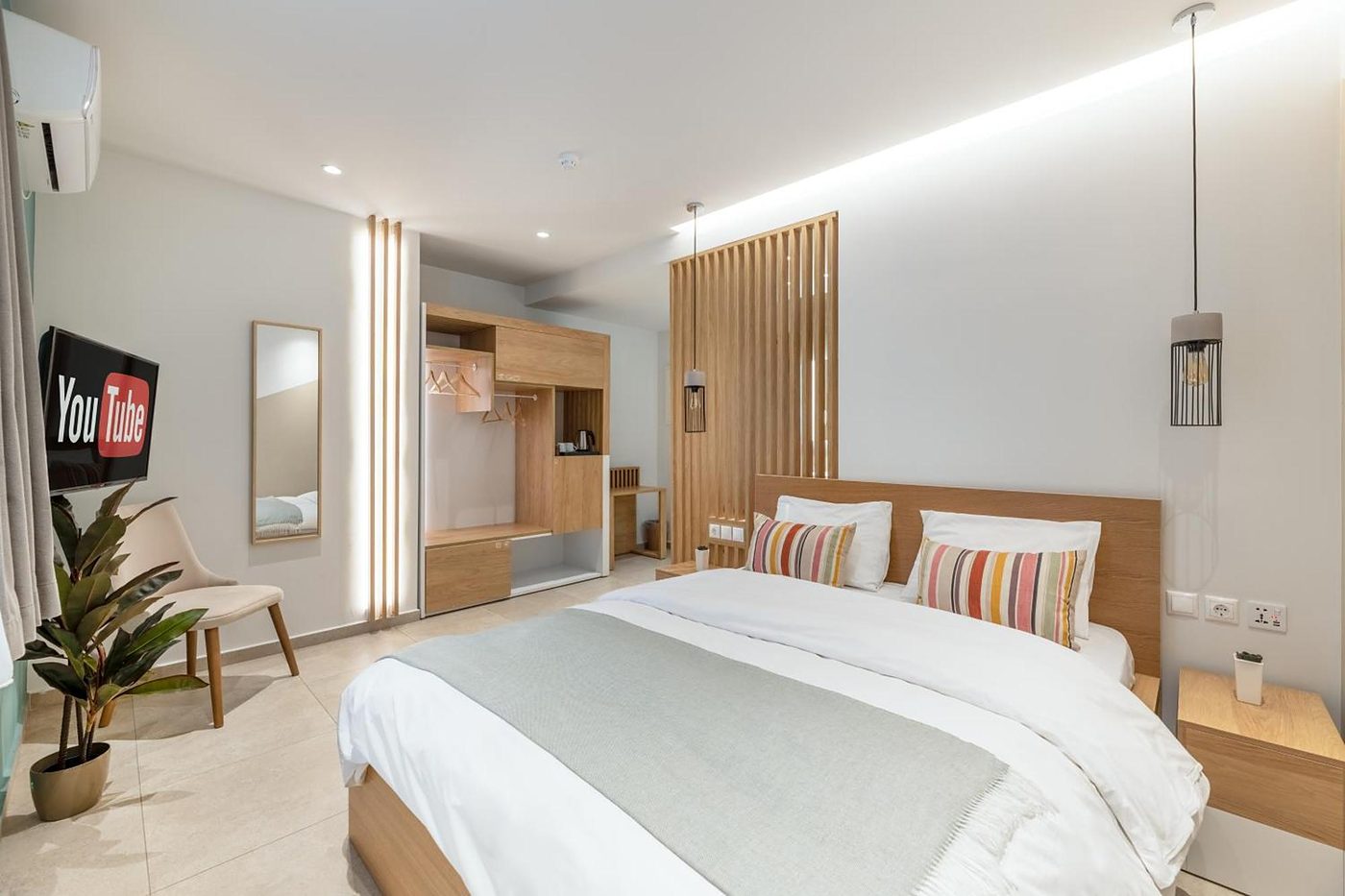 Studio Four, Pendants over the nightstands, cove above.