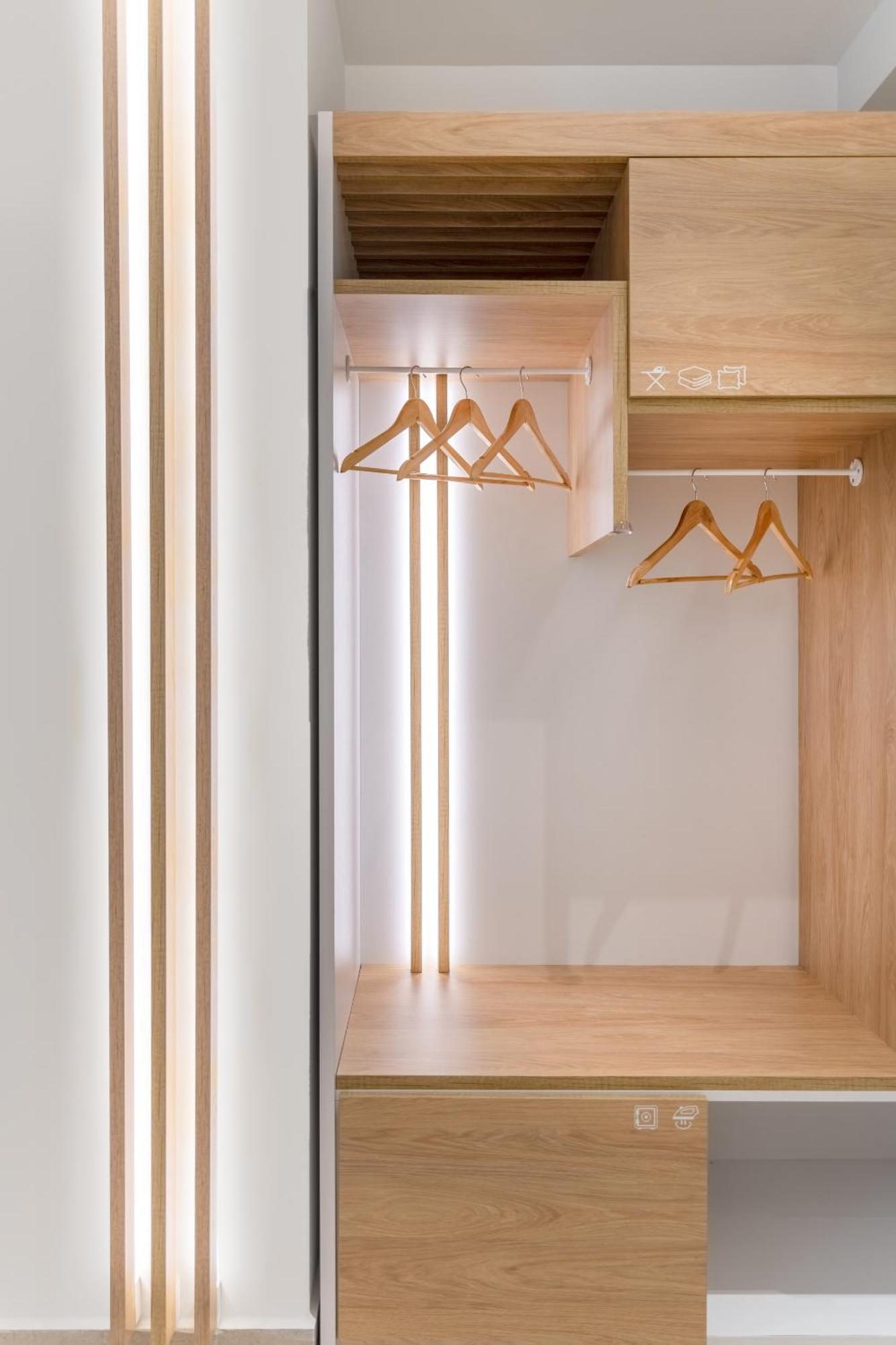 Studio Four, The wardrobe keeps the kettle and the hangers.
