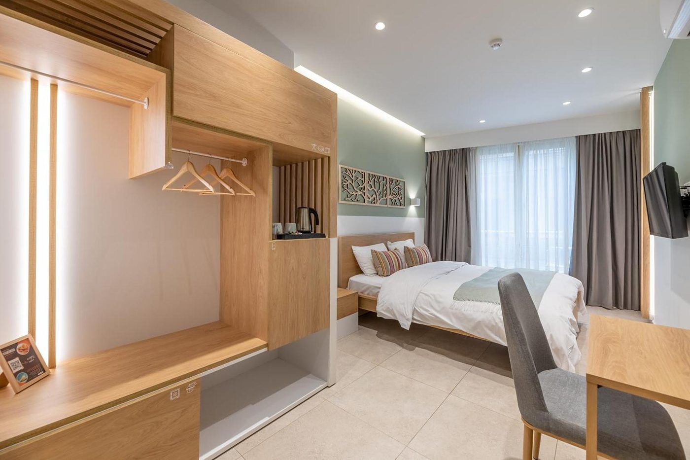 Studio Five, Oak wardrobe, the bed beyond.